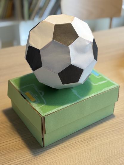 A truncated icosahedron made of paper