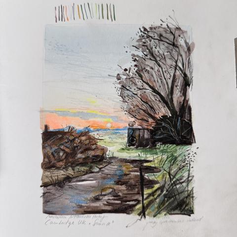 A mixedmedia illustration depicting a sunrise scene in Cambridge, UK. It features a winding path, cut wood in a large pile (left), a dark tree on the right, and a subtle gradient of colors in the sky with a bright white glowing sun (sadly I couldn’t capture this effect very good). Some color swatches are visible at the top of the sketchbook page