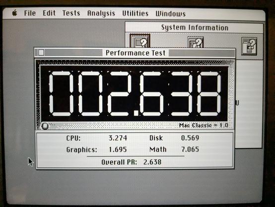 Photo of the performance test on a benchmark with the performer installed. It reports 2.6 times the speed of a Mac classic.