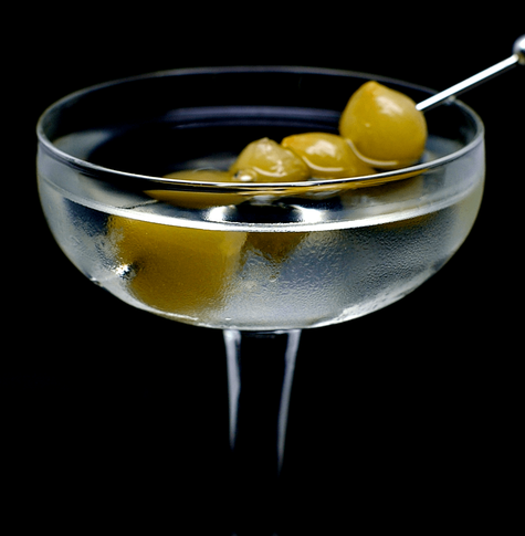 the cocktail itself in a chilled coupe and garnish with 4 cocktail onions