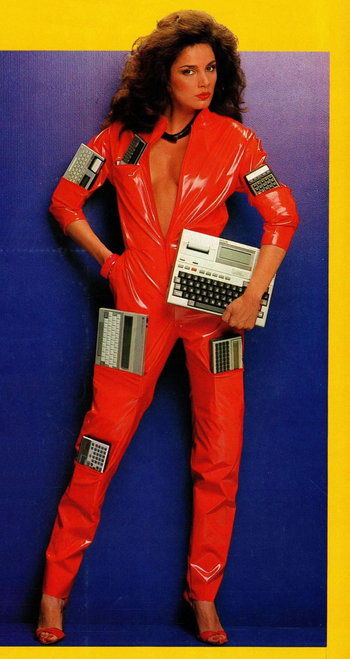 An advert from the 80s. It depicts a woman with voluminous feathered brown hair. She’s wearing a tight fitting vinyl onesie in violent red, unzipped to her navel. The onesie has multiple pockets in strange nonstandard places. In each, there are small computer keyboards of various shapes and sizes. She is looking at the camera and carrying something akin to the TRS80 model 100. She is ready as fuck to jack into cyberspace.