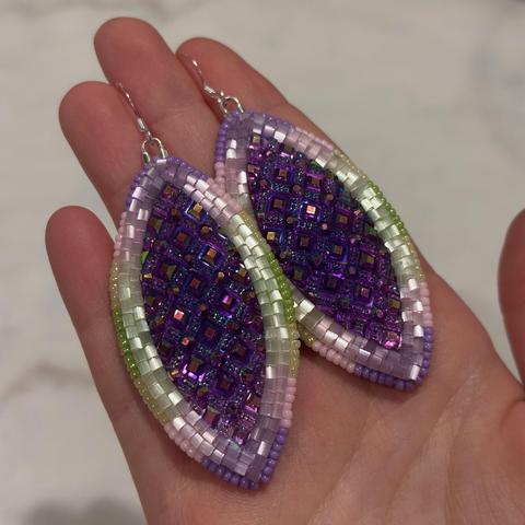 The same earrings with silver ear hooks attached. The shimmering of the beads shows better in this photo.