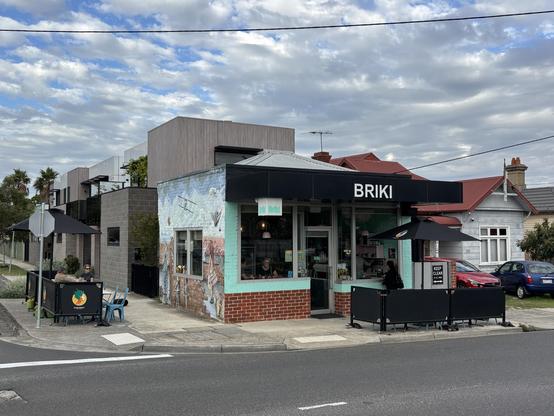 Attractive cafe on a street corner.