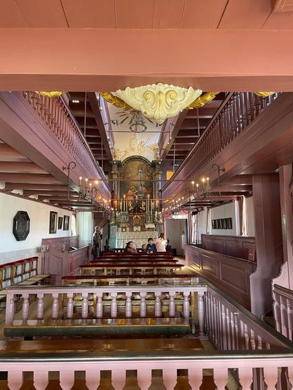An interior view of the museum, showing railings and columns and a generally opulent interior. Snazzy!
