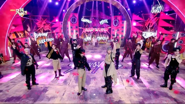 stray kids posing at the end of a performance of LALALALA on Music Bank
