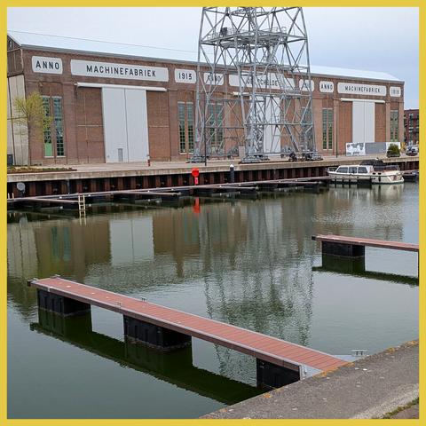 yacht harbour, renowned quay walls and the restored building of the machine factory