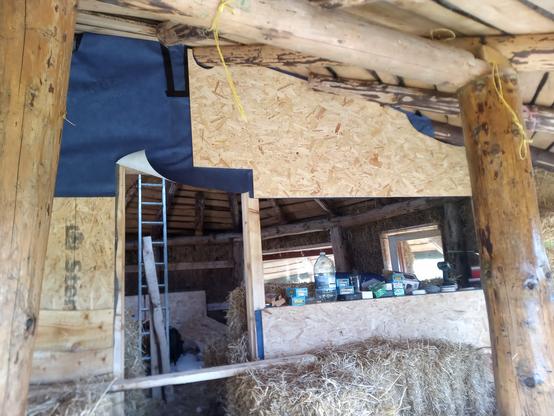 Oriented strand board spiled and fitted to protect the membrane. This is not the final cladding – there will be weatherboarding over this.