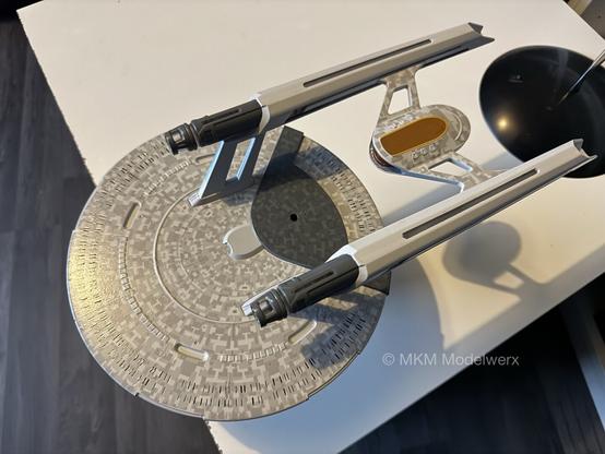 The model upside down on a white table