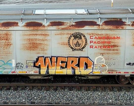 Train car with graffiti rolling through Kamloops BC Canada