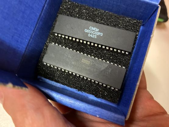 Two DIP40 ICs labeled 65c02
