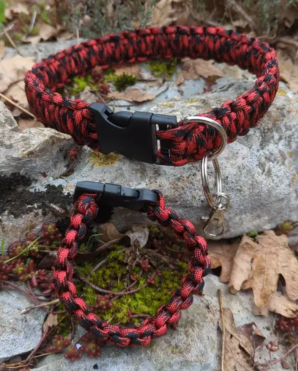 a collar and a bracelet made out of a black and red, flannel like paracord