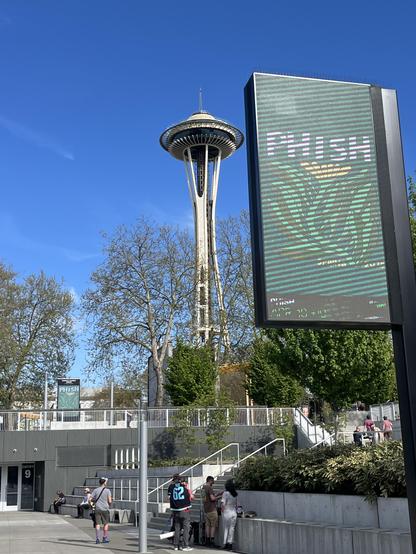 Space needle in Seattle with Phish marquee in foreground