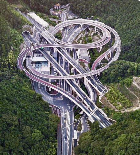 Same photo of the interchange taken during different season with the landscape around in lush greene