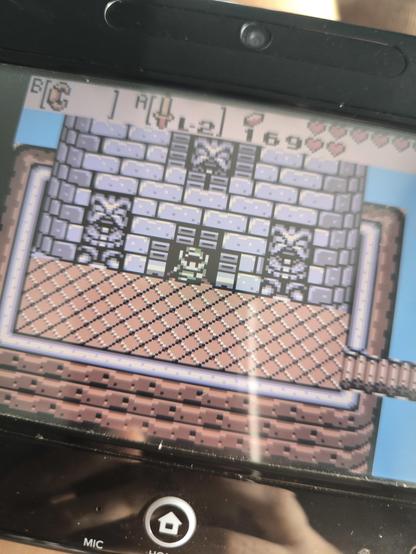 A picture of my WiiU displaying Link standing in the doorway of a castle.