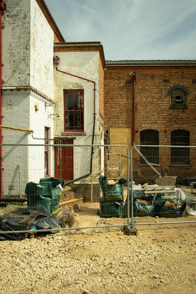 The exterior undergoing building work.