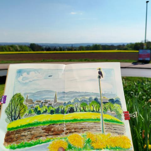 Sketchbook in front of the scene.