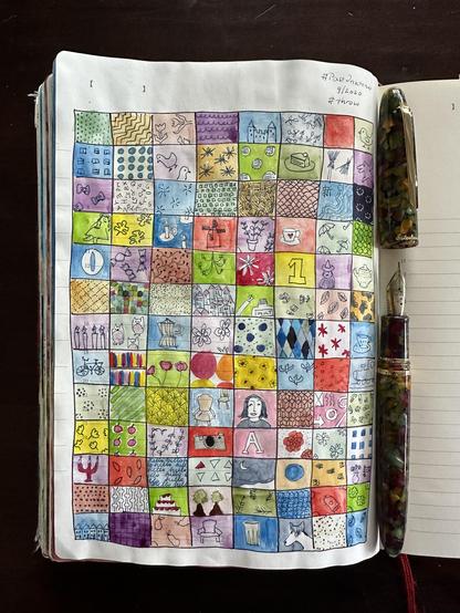 Sketch in sketchbook of a quilted throw with many different  patterns for each block