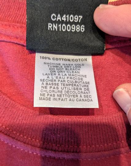 The "Old Time Hockey" shirt made in Canada label