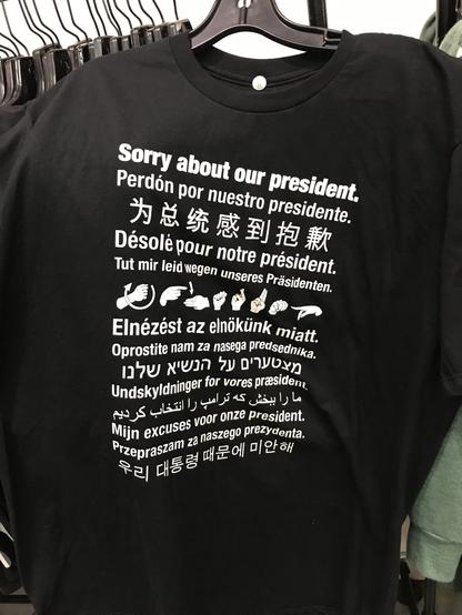 Tshirt with the words "Sorry about our president." written in many languages