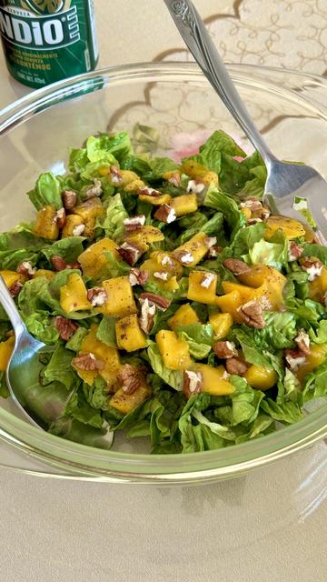 Lettuce, mango, and pecan salad