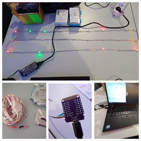 A collage showing a setup for testing individually addressable LED pixels.

The top image shows three parallel LED pixel strings taped to a table, with some LEDs lit in red, green, and blue. The LEDs are powered via an ESP32-S2 Mini microcontroller, which is connected to a laptop via USB. A laptop power adapter is also visible.

The bottom-left image shows a coiled bundle of unused LED pixel strings and a sealed ESP32 S2 mini.

The bottom-middle image is a close-up of the ESP32-S2 Mini with labeled pin headers and connected wires.

The bottom-right image shows the laptop to program the ESP32.