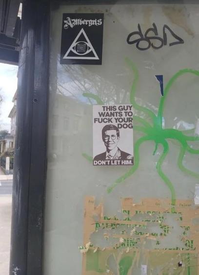 Photo of stickers on glass, there’s one with the bust of a smiling man in a suit and glasses & it says “THIS GUY WANTS TO FUCK YOUR DOG. DON’T LET HIM”

Apparently this man is the mayor of Providence