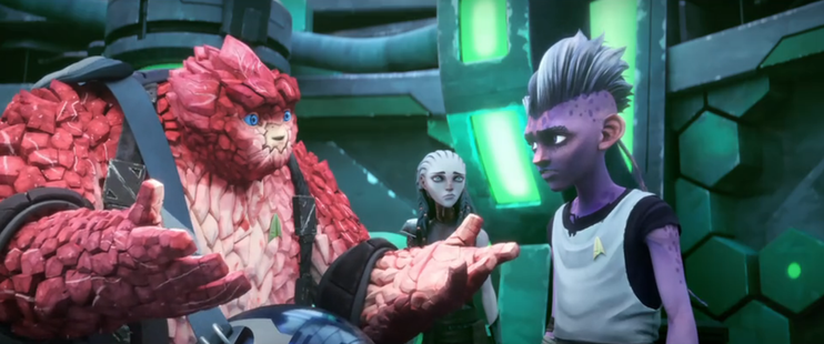 A shot of Rok trying to cheer up Dal in Dr. Jago's lab on Noble Isle.  Gwyn looks on.  From E115