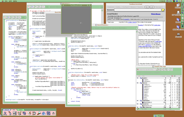 A screenshot of CodeWarrior running in Mac OS 9 with a bunch of code windows open full of C code, and in the front is a sample app with two windows named BasicWindow.