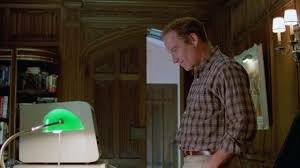 Scene from the end of 'Stand By Me' where Richard Dreyfus stands to look at the computer screen where he'd just written of the narrative that takes place in the movie before turning off the computer to erase it.