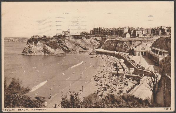 Printed sepia postcard showing a view of Towan Beach at Newquay in Cornwall.

Published by J. Salmon Ltd, Sevenoaks, No 16910.

Postally used on 7 June 1943 with single circle Newquay cancellation on orange 2d stamp and sent to Mr & Mrs Hunt, 48 Oxford Avenue, Merton Park, London SW20.

Good condition, with slight corner bumps, but some postmark seepage to front.