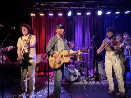 Fust on stage with the opening act, Styrofoam Winos.