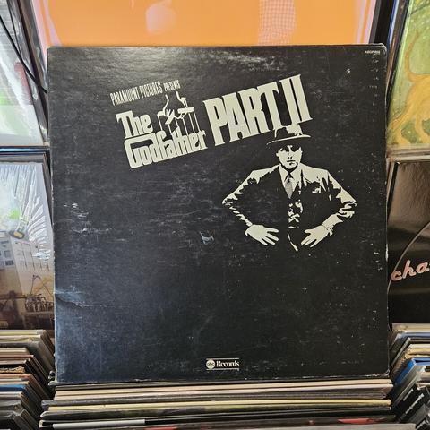 Black album cover features black and white image of Michael Corleone (Al Pacino) wearing a suit, tie, and hat, his hands on his waist.