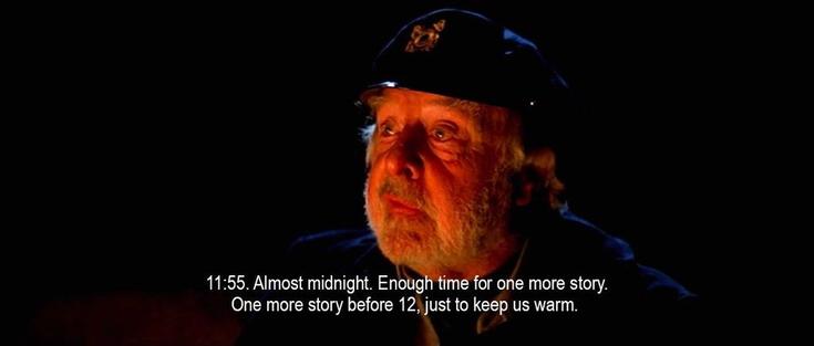 An old sailor, his face glowing from a campfire. “11:55. Almost midnight. Enough time for one more story. One more story before 12, just to keep us warm.”