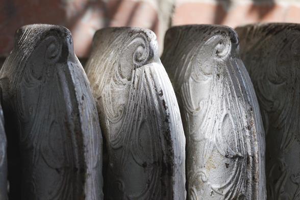 A close up of old radiant heaters showing off their age.