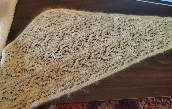 The Ivy Scarf laid out on a wood laminate table