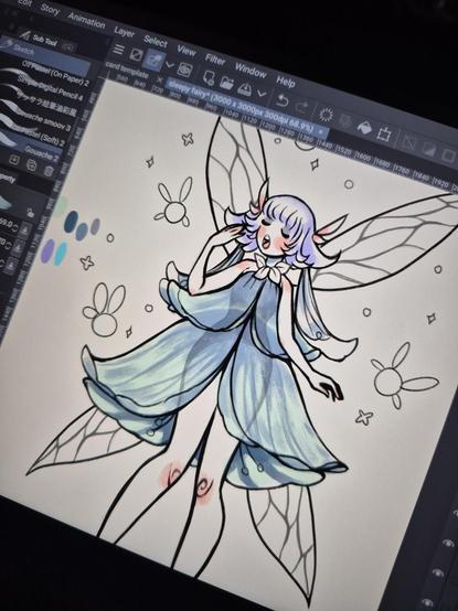 Photo of my drawing tablet showing a work in progress digital illustration of a sleepy fairy wearing petals as a dress, lifting a hand up to yawn behind. Little fairy wisps flit around them.