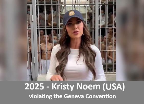 Kristy Noem, wearing a white long-sleeve white top and a dark baseball cap with an emblem, stands in front of, often innocently deported, people locked up for life in a prison that reminds us of modern day #Auschwitz #Barracks.

The individuals behind the bars appear to be wearing white clothing and are closely packed together. 

The text at the bottom reads: "2025 - Kristy Noem (USA) violating the #Geneva #Convention."
