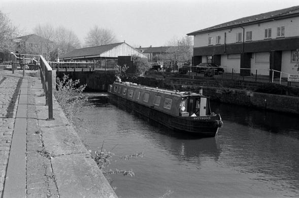 Narrowboat leaving the Lock at Trencherfield Mill, Wigan