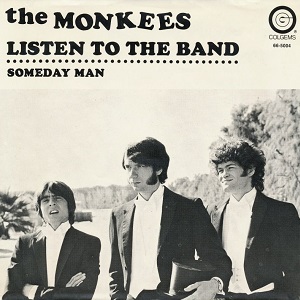 The cover art to The Monkees' 1969 single "Listen to the Band". The three Monkees are standing in a row - Davy Jones, Michael Nesmith, and Micky Dolenz -  are wearing tuxedos that orchestra conductors wear. The picture is in black and light creme, taken outdoors.