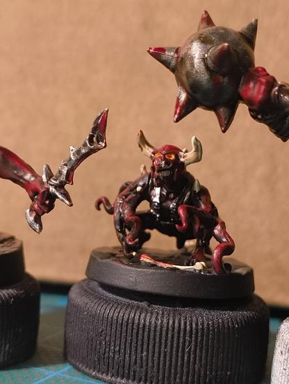 A little devourer demon with tentacles as arms