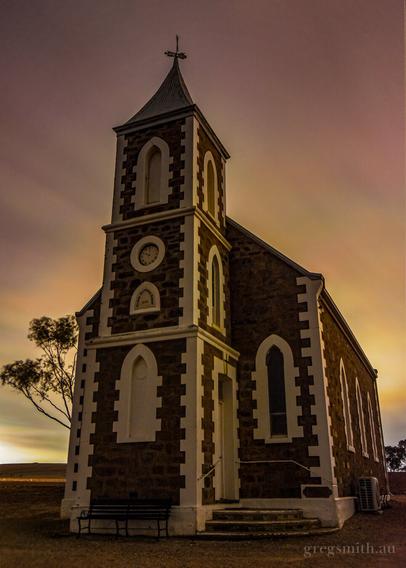 The 1890 Salem Lutheran Church, near Callington, South Australia, illuminated by light pollution.