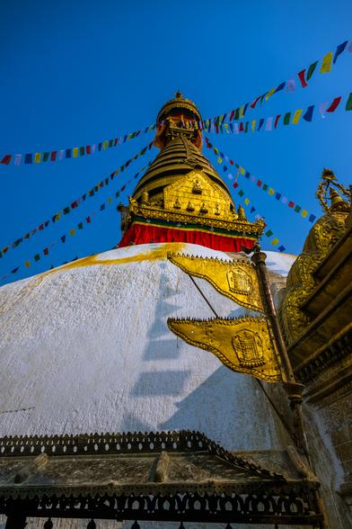 Low angle shot of golden metal flags in front of Buddha Stupa, Kathmandu, Nepal
Captured by Komeil Karimi