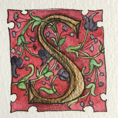Golden S letter with ornaments in a medieval style