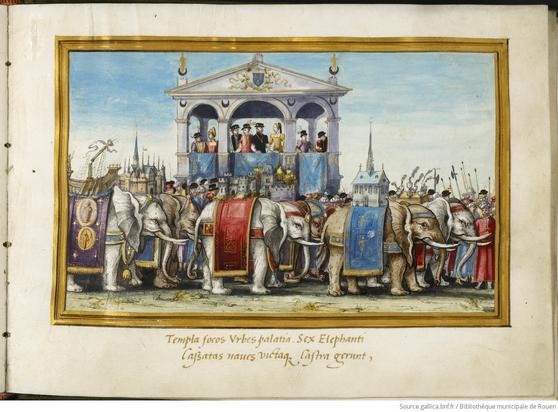 Un des feuillets du manuscrit Y 28 de la BM de Rouen, qui relate l'entrée de Henri II. Au premier plan, 6 éléphants, la plupart blanc, marchent, richement harnachés (violet, rouge et bleu). Les premiers, à droite de l'image, portent des bâtiments ; les seconds au centre, des châteaux et les derniers, à gauche (on ne voit pas leur arrière-train), un navire au mât brisé. En arrière-plan, une sorte de bâtiment surélevé est représenté. Il est composé de 3 arcades avec des personnages qui apparaissent dont, au centre, le roi Henri II, entouré de 2 hommes et d'une femme en jaune. A l'arrière, un ciel bleu.