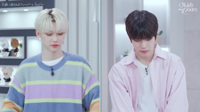 split-screen image of Felix and Seungmin being focused on Changbin, who is not onscreen but is on the floor pointing his butt at them.