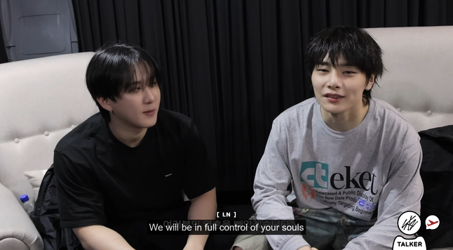 Changbin and I.N sit backstage. I.N looks at the camera and says, 'We will be in full control of your souls'