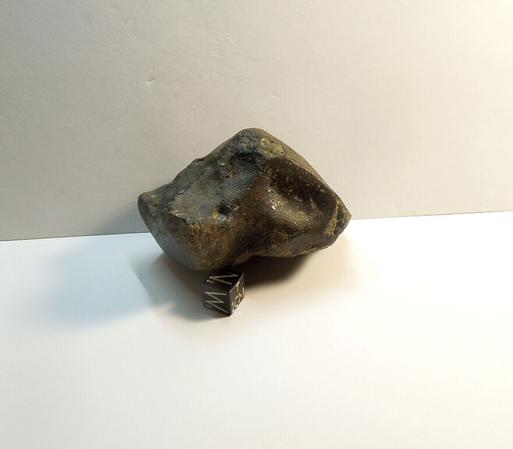 Got a sweet new meteorite yesterday.

It's an unclassified chondrite recovered out of the Moroccan Sahara.

It is a probable type-3 with fresh-ish fusion crust and a polished window showing the chondrule-filled interior.