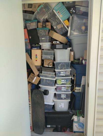 storage compartment that our apartment provides, a small closet (maybe 5x2ft) and full from bottom to top with stuff....(mostly electronics parts/robot parts, motors and stuff to build robots)
When I need something it's like playing Jenga, pull a box, what will fall.... It's how some of the stuff ends up laying sideways.... also how the heavy stuff end up on top because of course it's the heavy stuff I use more then anything else.... LOL. 

I've got to stop it, I've got to get a handle on this issue.