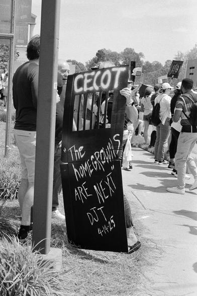 A CECOT-related protest sign, “the homegrowns are next”