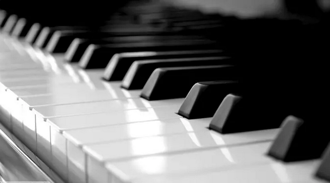 Black and white image of a piano keyboard